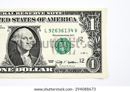 Close up of one dollar isolate on white background. 