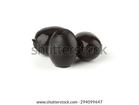 Black olives isolated on white background close-up