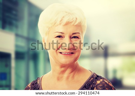 Portrait of and old, casual woman