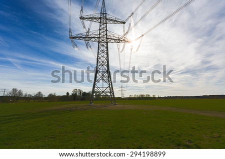 Electricity towers in landscape 