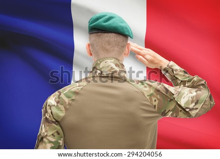 Soldier in hat facing national flag series - France