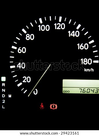 Speedometer in car, fuel, black background, auto