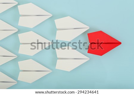red paper plane leading white ones, leadership concept Royalty-Free Stock Photo #294234641