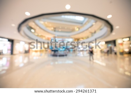 Blurred shopping mall background with color tone tuned