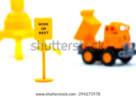 The construction sign with work or rest word