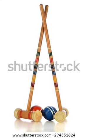 Vintage mallets and balls of croquet game isolated over white background - With clipping path Royalty-Free Stock Photo #294351824