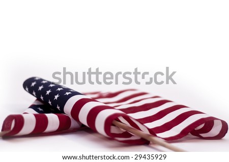 American flag on wooden stick on white background
