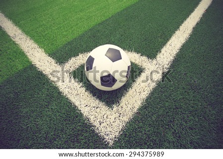 soccer ball or football on soccer field vintage color