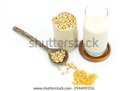 Soy beans in sack bag and soy milk isolated on white background