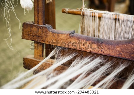 A closeup image of an old weaving Loom, details.