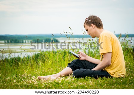 man with phone in nature