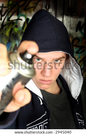 Bad guy with spray. See other photos of teenagers in my portfolio.