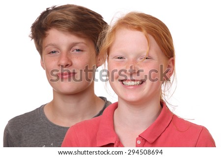 Portrait of two happy teenagers on white background