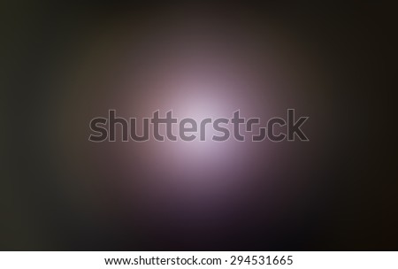 Abstract defocused blurred purple image with light in center