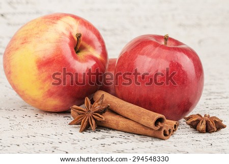 Red apple with cinnamon and anise stars