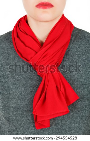 Red silk scarf around her neck isolated on white background. Female accessory. Royalty-Free Stock Photo #294554528
