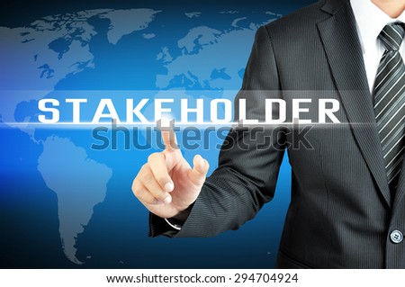 Businessman hand touching STAKEHOLDER word on virtual screen