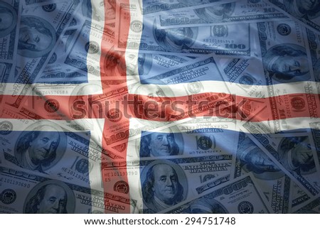 colorful waving icelandic flag on a american dollar money background