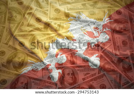 colorful waving bhutan flag on a american dollar money background