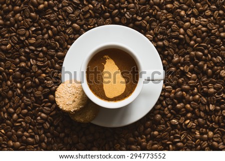 Still life photography of hot coffee beverage with map of Sri Lanka