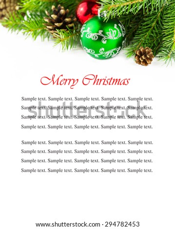 Merry Christmas postcard. Close-up view of green christmass ball with fur-tree branches and cones isolated on white background