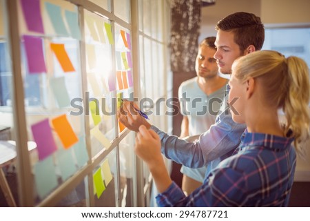 Young creative business people at office Royalty-Free Stock Photo #294787721