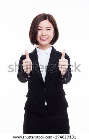 Successful happy Asian businesswoman showing thumb isolated on white background. 