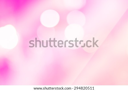 Abstract bokeh in exhibition hall with pink color filter