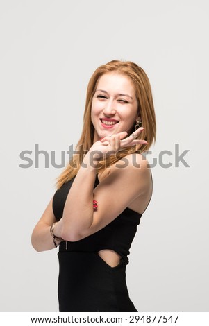 Yound model with peace hand gesture smiling