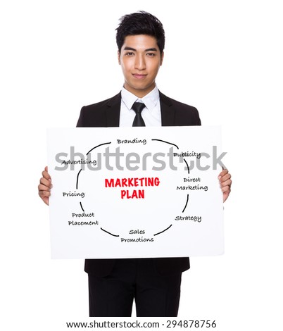 Businessman hold with white card board presenting marketing planning
