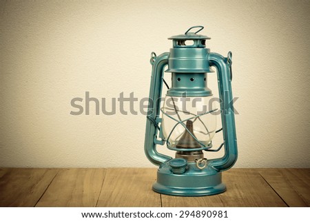 still life,old lamp on wooden table,vintage picture