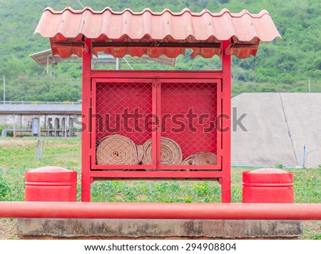 old fire fighting equipment unit of factory nature background