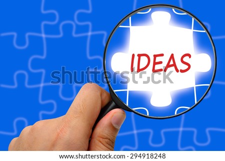 IDEAS word. Magnifier and puzzles.