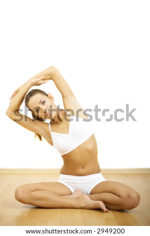 Young beautiful woman during fitness time and exercising Royalty-Free Stock Photo #2949200