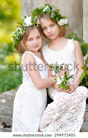 Portrait of two girls in the woods girlfriends