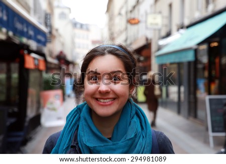 Close-up portrait of beautiful girl in the city
