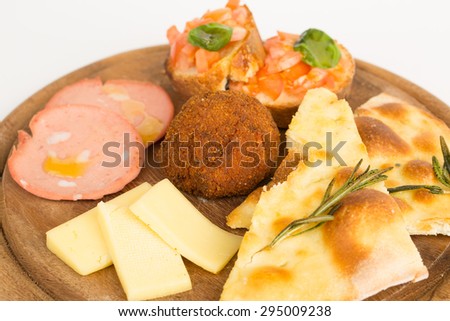 Image of tasty food: cheese, sausage, pizza, rissole, sandwiches