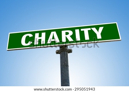 CHARITY word on green road sign