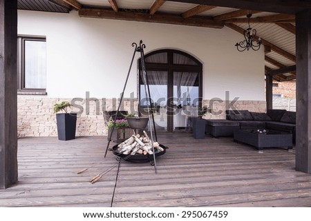 Picture of modern stylish patio with fireplace
