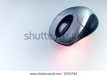  Wireless mouse with red laser in a tech background