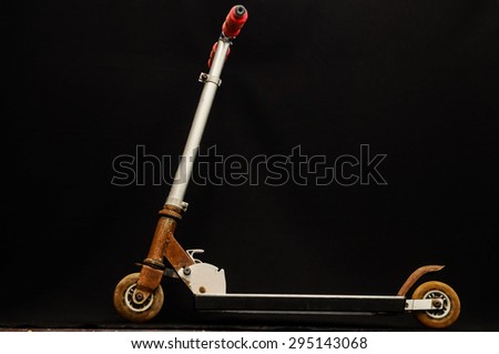Metal scooter for child on white background