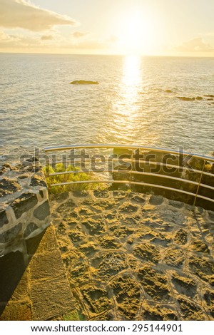 HDR Picture Sunrise on a Pier over Atlantic Ocean in Tenerife Canary Islands Spain