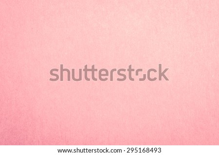 Recycled craft paper textured background in light pink old rose color  Royalty-Free Stock Photo #295168493