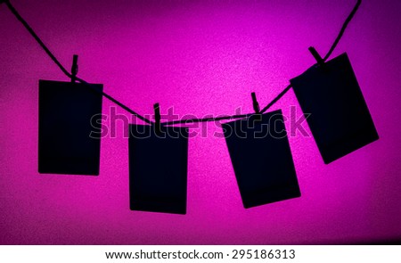 Silhouette instant film on a rope blur abstract colorful background images 