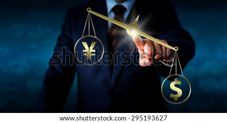 US dollar outweighing the Chinese yuan renminbi or Japanese yen on a golden scale. Torso of a trader touching a virtual balance. Theme of currency transaction in the modern foreign exchange market.