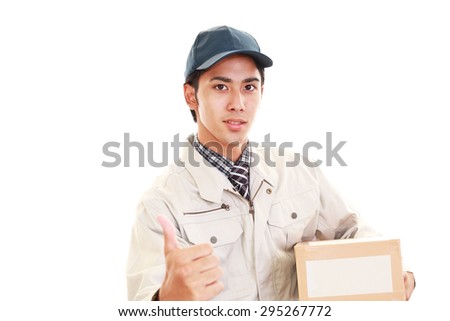 Smiling delivery man isolated on white background