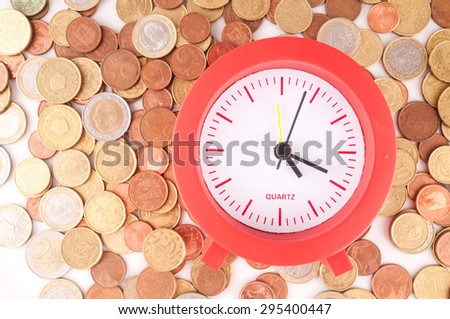 Picture of a Business Money Concept Idea, Clock and Coins