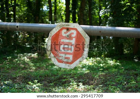 Stop sign turned upside-down at park Zobnatica, Serbia. Photo was taken on a nice sunny day.
