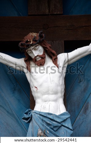Portrait of Jesus on wooden cross