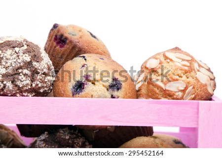 Muffins in box isolated on a white background